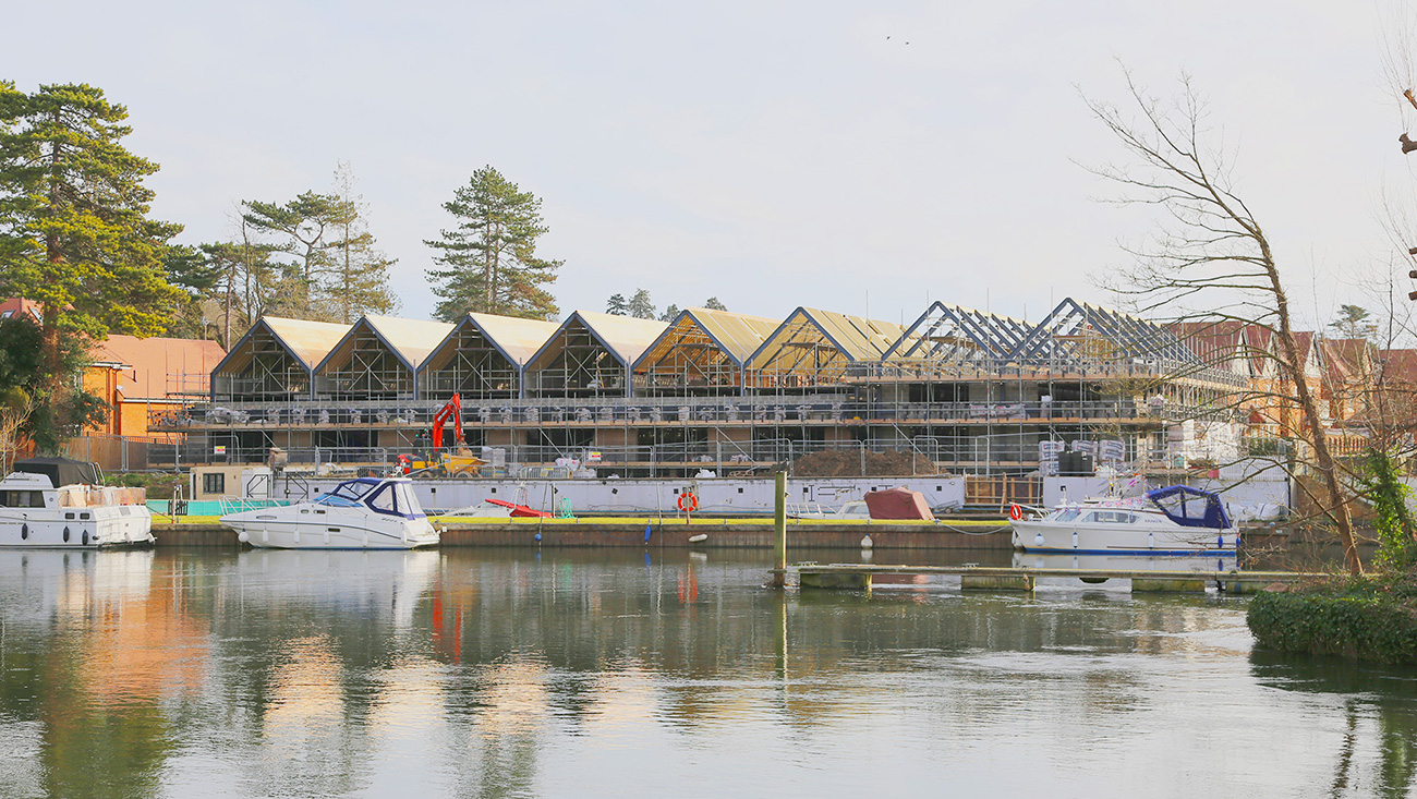 The Old Boathouse housing development designed by Napier Clarke Architects under construction, view from the river Thames.